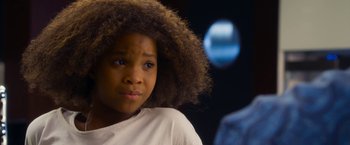 Movie still from “Annie” (2014), directed by Will Gluck – A person with a curly hair; Close Up shot, Over the shoulder angle