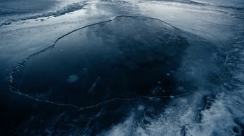 A view of a large body of water in the middle of the day