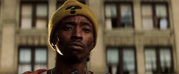 Movie still from “Armageddon” (1998), directed by Michael Bay – A person wearing a hat; Close Up shot, Low angle