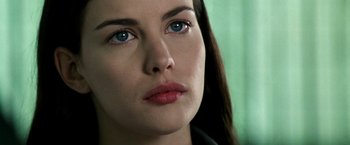 Movie still from “Armageddon” (1998), directed by Michael Bay – A woman's face with blue eyes; Close Up shot, Over the shoulder angle