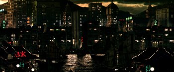 Movie still from “Armageddon” (1998), directed by Michael Bay – Many boats in the water at night time; Extreme Wide shot, High angle
