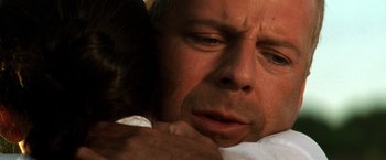 Movie still from “Armageddon” (1998), directed by Michael Bay – A person sleeping on a bed; Close Up shot, Over the shoulder angle