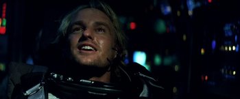 Movie still from “Armageddon” (1998), directed by Michael Bay – A person wearing a motorcycle jacket; Close Up shot, Low angle