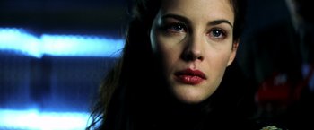 Movie still from “Armageddon” (1998), directed by Michael Bay – A person wearing a red lipstick; Close Up shot, Low angle