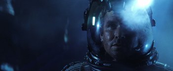 Movie still from “Armageddon” (1998), directed by Michael Bay – A person wearing a space helmet; Close Up shot, Low angle