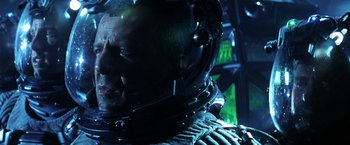 Movie still from “Armageddon” (1998), directed by Michael Bay – A man in a space suit; Close Up shot, Low angle
