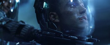 Movie still from “Armageddon” (1998), directed by Michael Bay – A man's face in a space helmet; Close Up shot, Low angle