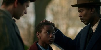 Movie still from “Fargo” (2014), created by Noah Hawley – A young boy getting his head examined by a doctor; Close Up shot, Over the shoulder angle