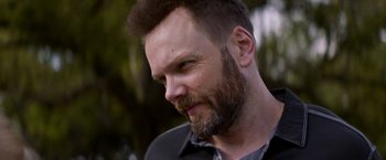 Movie still from “Assassination Nation” (2018), directed by Sam Levinson – A person with a beard; Close Up shot, Over the shoulder angle