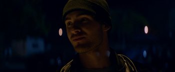 Movie still from “Assassination Nation” (2018), directed by Sam Levinson – A person wearing a hat; Close Up shot, Low angle