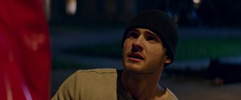 Movie still from “Assassination Nation” (2018), directed by Sam Levinson – A person wearing a hat; Close Up shot, Low angle