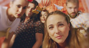 Movie still from “Attila Marcel” (2013), directed by Sylvain Chomet – A group of people standing next to each other; Close Up shot, Overhead angle