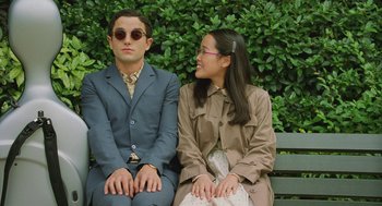 Movie still from “Attila Marcel” (2013), directed by Sylvain Chomet – A man and a woman sitting on a park bench; Medium shot, Over the shoulder angle