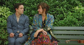 Movie still from “Attila Marcel” (2013), directed by Sylvain Chomet – Two people sitting on a park bench next to each other; Medium shot, Over the shoulder angle