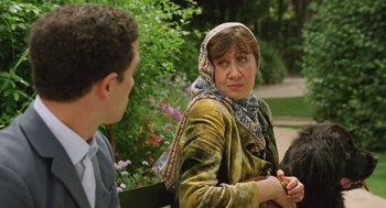 Movie still from “Attila Marcel” (2013), directed by Sylvain Chomet – A woman wearing a headscarf sitting next to a man on a park bench; Close Up shot, Over the shoulder angle