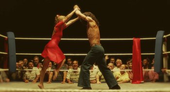 Movie still from “Attila Marcel” (2013), directed by Sylvain Chomet – A couple of people that are in a boxing ring; Medium shot, Low angle