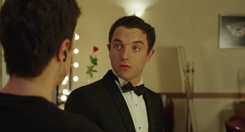 Movie still from “Attila Marcel” (2013), directed by Sylvain Chomet – A man in a tuxedo looking at himself in the mirror; Close Up shot, Over the shoulder angle