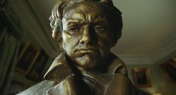 Movie still from “Attila Marcel” (2013), directed by Sylvain Chomet – The face of a statue; Extreme Close Up shot, Low angle