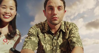 Movie still from “Attila Marcel” (2013), directed by Sylvain Chomet – A person wearing a green shirt; Close Up shot, Low angle