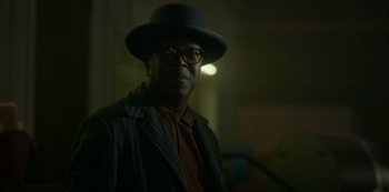 Movie still from “Fargo” (2014), created by Noah Hawley – A man wearing a hat and a jacket; Close Up shot, Low angle