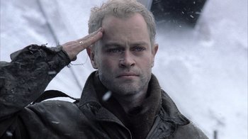 Movie still from “Band of Brothers” (2001), directed by David Frankel – A person wearing a jacket; Close Up shot, Low angle