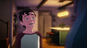 Movie still from “Batman and Superman: Battle of the Super Sons” (2022), directed by Matt Peters – A cartoon of a young man looking up at a table; Close Up shot, Over the shoulder angle