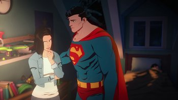Movie still from “Batman and Superman: Battle of the Super Sons” (2022), directed by Matt Peters – A man and a woman are standing next to each other; Medium shot, Over the shoulder angle