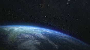 Movie still from “Batman and Superman: Battle of the Super Sons” (2022), directed by Matt Peters – A view of the earth taken from the space station; Extreme Wide shot, Overhead angle