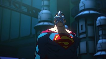 Movie still from “Batman and Superman: Battle of the Super Sons” (2022), directed by Matt Peters – A man in a superman costume standing in front of a building; Medium shot, Low angle