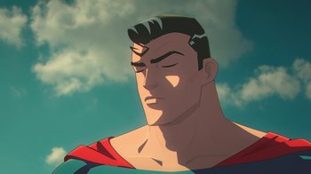 Movie still from “Batman and Superman: Battle of the Super Sons” (2022), directed by Matt Peters – A man's face in a cartoon style; Close Up shot, Low angle
