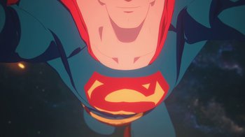 Movie still from “Batman and Superman: Battle of the Super Sons” (2022), directed by Matt Peters – View of the chest of superman; Extreme Close Up shot, Low angle