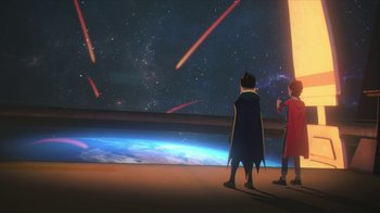 Movie still from “Batman and Superman: Battle of the Super Sons” (2022), directed by Matt Peters – Two people standing in front of a large screen; Extreme Wide shot, Low angle