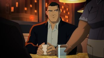 Movie still from “Batman: Death in the Family” (2020), directed by Brandon Vietti – A man sitting at a table holding a coffee cup; Medium shot, Over the shoulder angle