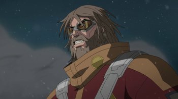 Movie still from “Batman: Death in the Family” (2020), directed by Brandon Vietti – An image of a man with long hair and a beard; Close Up shot, Low angle