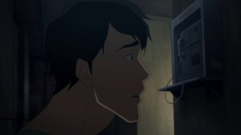 Movie still from “Batman: Death in the Family” (2020), directed by Brandon Vietti – A young man looking at a television in a dark room; Close Up shot, Low angle