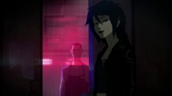 Movie still from “Batman: Death in the Family” (2020), directed by Brandon Vietti – A man standing next to a woman in front of a window; Medium shot, Over the shoulder angle