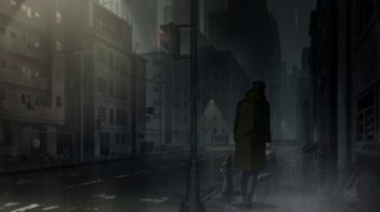Movie still from “Batman: Death in the Family” (2020), directed by Brandon Vietti – A man in a trench coat walking down a street; Wide shot, High angle