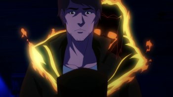 Movie still from “Batman: Death in the Family” (2020), directed by Brandon Vietti – A young man with a flame around his neck; Close Up shot, Over the shoulder angle