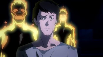 Movie still from “Batman: Death in the Family” (2020), directed by Brandon Vietti – A young man is standing in front of a fire; Close Up shot, Over the shoulder angle