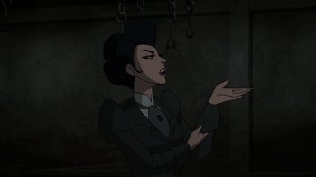 Movie still from “Batman: Gotham by Gaslight” (2018), directed by Sam Liu – A woman in a black suit and a black hat; Medium shot, Over the shoulder angle