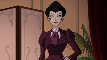 Movie still from “Batman: Gotham by Gaslight” (2018), directed by Sam Liu – A woman in a purple suit standing in front of a mirror; Medium shot, Over the shoulder angle