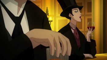 Movie still from “Batman: Gotham by Gaslight” (2018), directed by Sam Liu – A woman wearing a top hat and a black suit; Medium shot, Over the shoulder angle