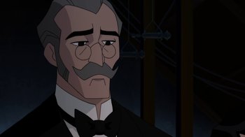 Movie still from “Batman: Gotham by Gaslight” (2018), directed by Sam Liu – An old man with a mustache wearing a suit and bow tie; Close Up shot, Over the shoulder angle