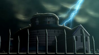 Movie still from “Batman: Gotham by Gaslight” (2018), directed by Sam Liu – An image of a building that is in the middle of the night; Extreme Wide shot, Low angle