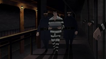 Movie still from “Batman: Gotham by Gaslight” (2018), directed by Sam Liu – A man in a striped shirt is holding a plate; Wide shot, High angle
