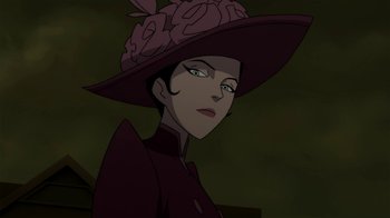 Movie still from “Batman: Gotham by Gaslight” (2018), directed by Sam Liu – A woman in a purple hat is looking at the camera; Close Up shot, Low angle