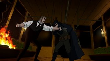 Movie still from “Batman: Gotham by Gaslight” (2018), directed by Sam Liu – Two men fighting in a room with a bat in their hand; Medium shot, Over the shoulder angle