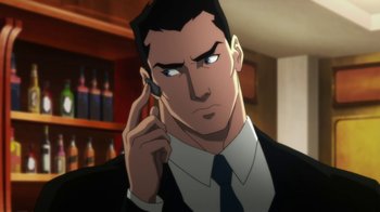 Movie still from “Batman: Hush” (2019), directed by Justin Copeland – A man in a suit and tie talking on a cell phone; Close Up shot, Over the shoulder angle