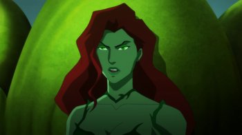 Movie still from “Batman: Hush” (2019), directed by Justin Copeland – A woman with long red hair and green eyes; Close Up shot, High angle