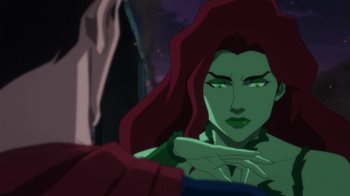 Movie still from “Batman: Hush” (2019), directed by Justin Copeland – A person with long red hair; Close Up shot, Over the shoulder angle